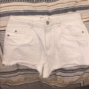 Women’s White Ripped Jean Shorts